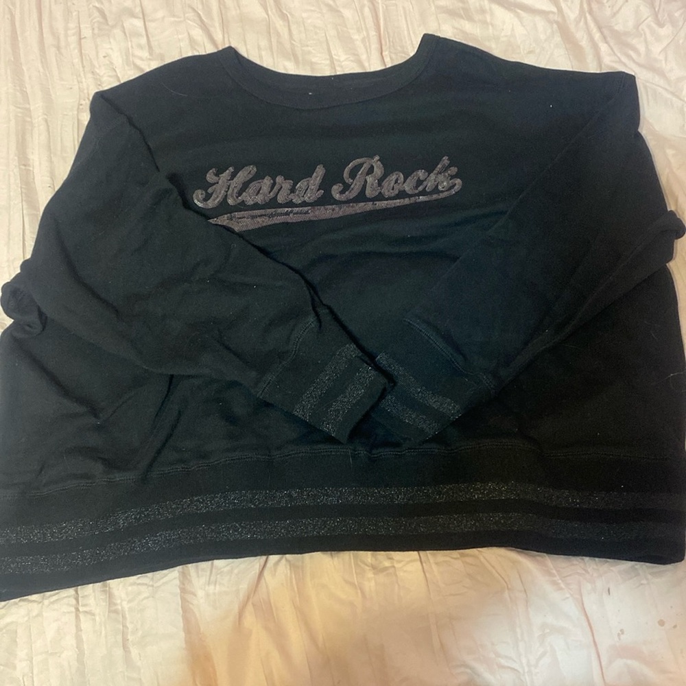 I am selling my old Hard Rock Cafe crewneck if anyone would be interested!